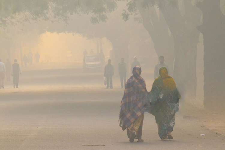 A street in India filled with smoke